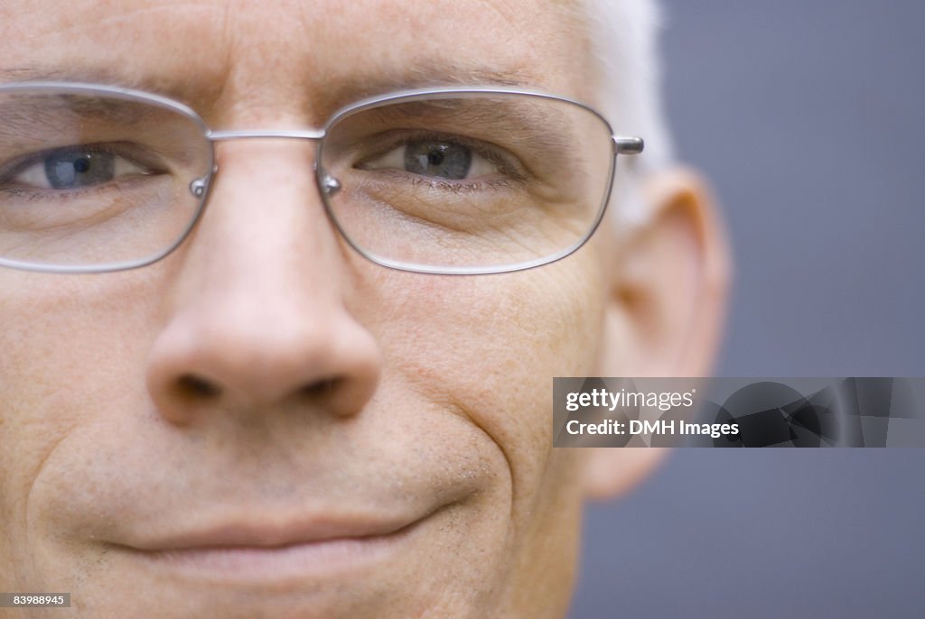 Close up of Mature Man in Glasses.
