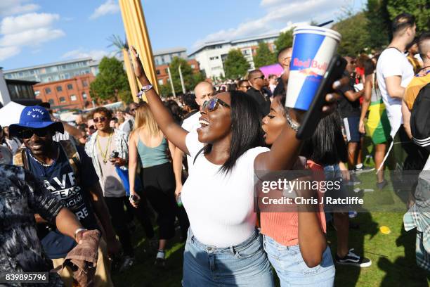 Carnival goers attend the 'Red Bull Music Academy Soundsystem' at Notting Hill Carnival 2017 on August 27, 2017 in London, England.