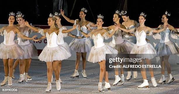 Russian ice skaters perform during the first day of the "Nutcracker" ballet by Russian composer Pyotr Ilyich Tchaikovsky at the ice rink at Zocalo...