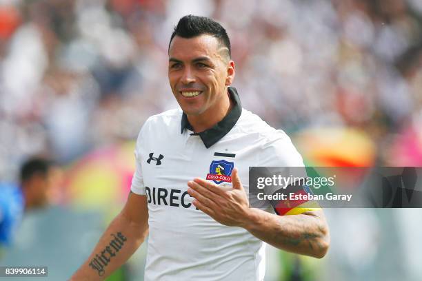 Esteban Paredes of Colo-Colo celebrates after scoring the third goal of his team during a match between Colo-Colo and U de Chile as part of Torneo...