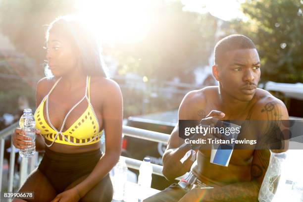 Carnival goers backstage at the 'Red Bull Music Academy Soundsystem' at Notting Hill Carnival 2017 on August 27, 2017 in London, England.