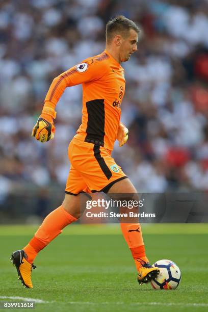 Thomas Heaton of Burnley celebrates his sides first goal during the Premier League match between Tottenham Hotspur and Burnley at Wembley Stadium on...