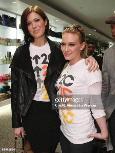 Mandy Moore and Hilary Duff at the "Stand Up To Cancer" Charity Event at Kitson Studio on December 10, 2008 in Los Angeles, California.