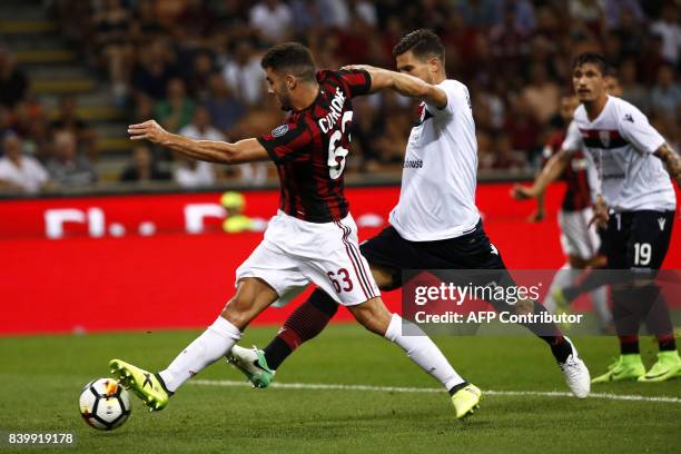 Milan's forward Patrick Cutrone scores a goal during the Italian Serie A football match AC Milan Vs Cagliari on August 27, 2017 at the 'Giuseppe...