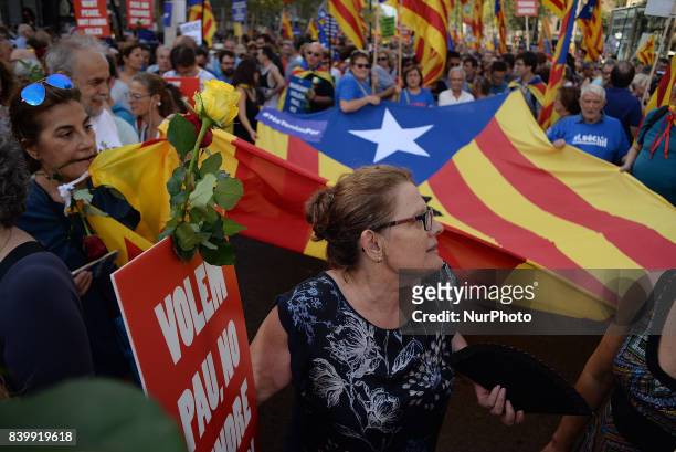 Thousands of people march against terrorism after deadly van attack in Barcelona in 26th August, 2017.The Catalan capital demonstrates under the...