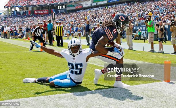 Kevin White of the Chicago Bears steps out of the endzone after making a catch against Adoree' Jackson of the Tennessee Titans during the first half...