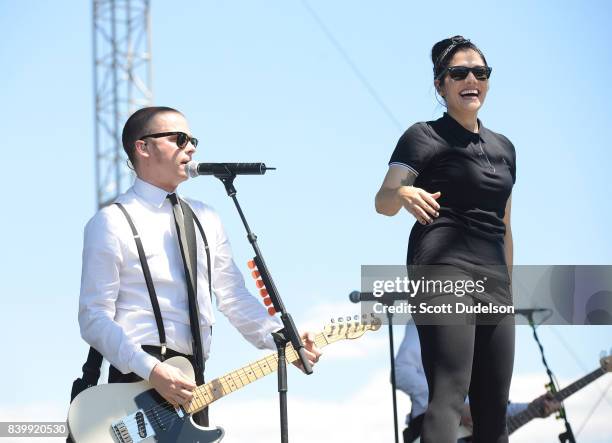 Musicians Kevin Bivona and Aimee Allen of the band The Interrupters perform onstage during the Its Not Dead 2 Festival at Glen Helen Amphitheatre on...