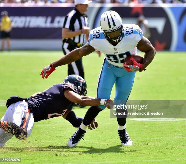 Derrick Henry of the Tennessee Titans is tackled by Quintin Demps of the Chicago Bears during the first half at Nissan Stadium on August 27, 2017 in...