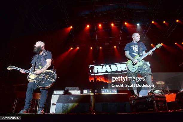 Guitarist/singer Tim Armstrong and Lars Frederiksen and the punk band Rancid perform onstage during the Its Not Dead 2 Festival at Glen Helen...