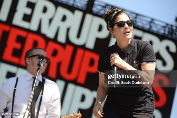 Musicians Kevin Bivona and Aimee Allen of the band The Interrupters perform onstage during the Its Not Dead 2 Festival at Glen Helen Amphitheatre on...