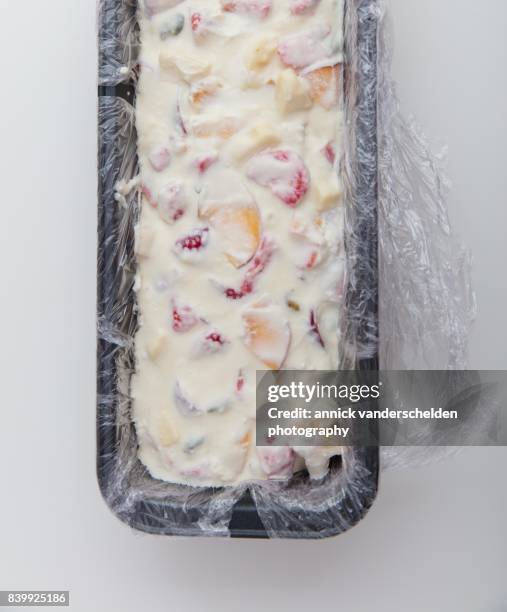 frozen semifreddo preparation mixture in a cake mold. - g force test stock pictures, royalty-free photos & images