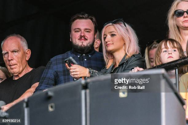John Bradley-West from Game of Thrones watches Liam Gallagher perform at Reading Festival at Richfield Avenue on August 27, 2017 in Reading, England.