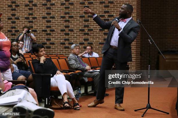 Charlottesvill Vice-Mayor Wes Bellamy speaks during a 'community recovery' town hall meeting conducted by the Department of Justice's Community...