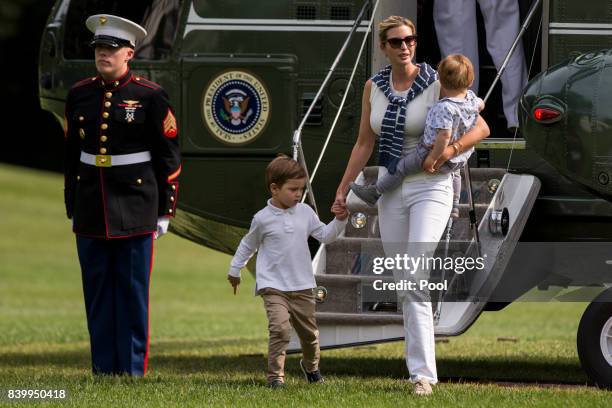 Special Advisor Ivanka Trump with her children Joseph and Theodore, 1 exit Marine One on the South Lawn August 27, 2017 in Washington, DC. Trump is...