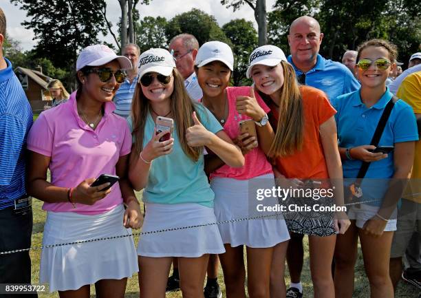 Bunch of young fans pose for a picture during the final round of THE NORTHERN TRUST at Glen Oaks Club on August 27 in Old Westbury, New York.