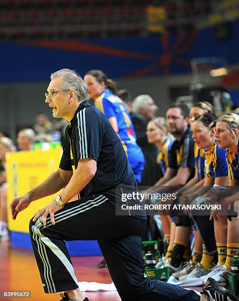 Sweden's head coach Schefvert Ulf directs his team against Croatia during the 8th Women's Handball European Championships match on December 11, 2008...
