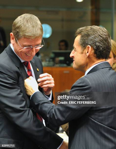 France's President Nicolas Sarkozy , whose country holds the EU rotating presidency talks to Hungary's Prime Minister Ferenc Gyurcsany prior to a...