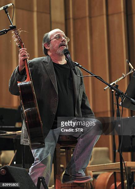 Cuban singer-songwriter Silvio Rodriguez performs on December 10, 2008 in the Amadeo Roldan theater during a concert to commemorate the 60th...