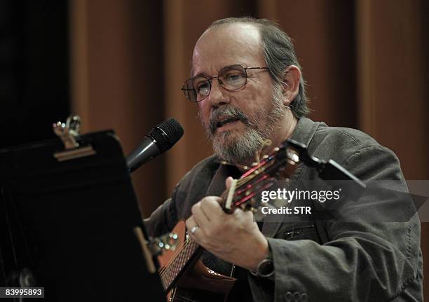 Cuban singer-songwriter Silvio Rodriguez performs on December 10, 2008 in the Amadeo Roldan theater during a concert to commemorate the 60th...