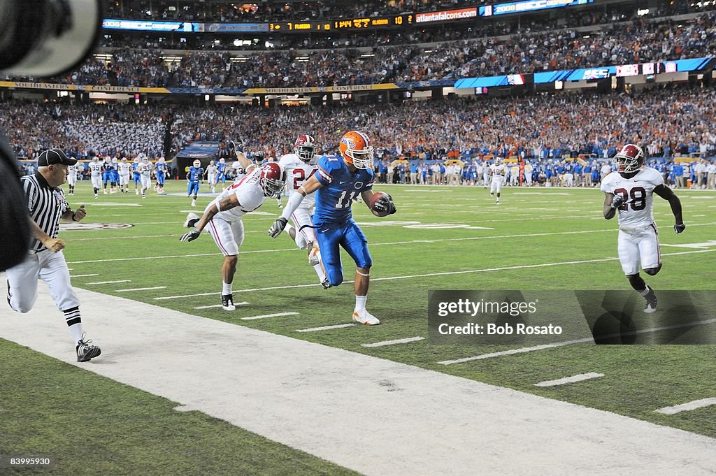 Florida Versus Riley Florida Riley Cooper in action, rushing down sidelines vs Alabama ...