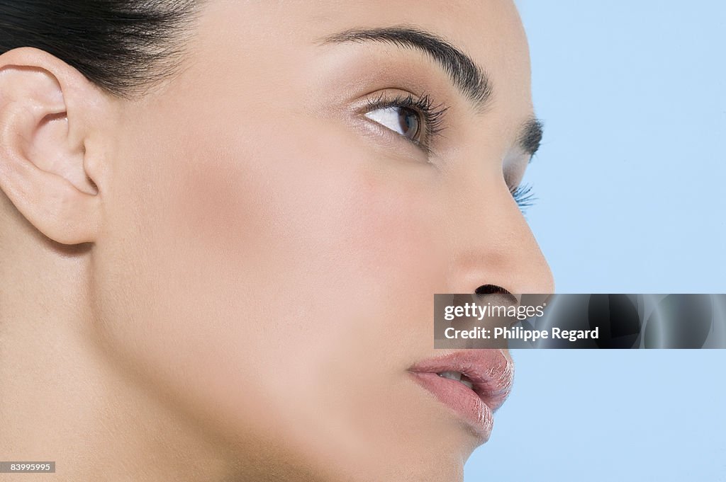 Young beautiful woman, close-up