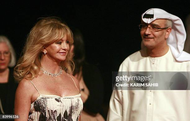 Actress Goldie Hawn arrives for the opening night of the Dubai International Film Festival's fifth edition in Dubai on December 11 as the festival's...