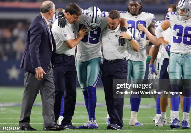 Dallas Cowboys middle linebacker Anthony Hitchens is forced to leave the game after an injury in the second quarter against the Oakland Raiders at...