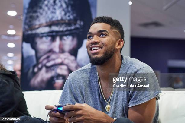 Karl-Anthony Towns and Ashley Glassel live stream "Call of Duty: WWII" beta on August 27, 2017 in Minneapolis, Minnesota.