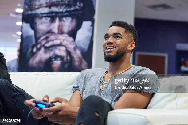 Karl-Anthony Towns and Ashley Glassel live stream "Call of Duty: WWII" beta on August 27, 2017 in Minneapolis, Minnesota.