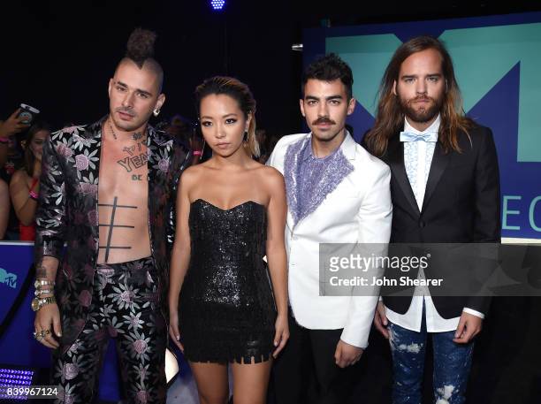 Cole Whittle, JinJoo Lee, Joe Jonas, and Jack Lawless of DNCE attend the 2017 MTV Video Music Awards at The Forum on August 27, 2017 in Inglewood,...