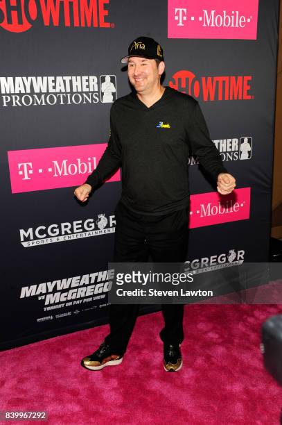 Professional poker player Phil Hellmuth attends the VIP party before the boxing match between boxer Floyd Mayweather Jr. And Conor McGregor at...