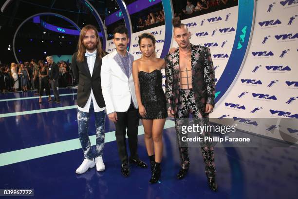 Jack Lawless, Joe Jonas, JinJoo Lee, and Cole Whittle of music group DNCE attend the 2017 MTV Video Music Awards at The Forum on August 27, 2017 in...