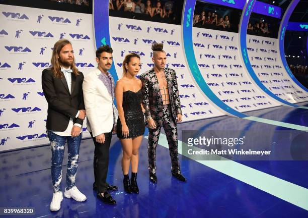 Jack Lawless, Joe Jonas, JinJoo Lee and Cole Whittle of musical group DNCE attends the 2017 MTV Video Music Awards at The Forum on August 27, 2017 in...