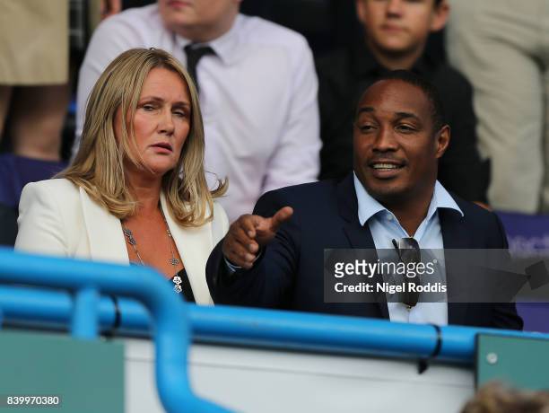 Paul Ince looks on next to his wife Claire during the Premier League match between Huddersfield Town and Southampton at Galpharm Stadium on August...