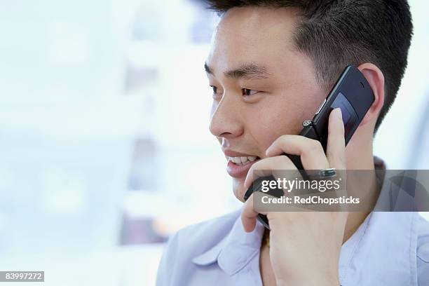 Man Using Red Telephone 210 Red Flip Phone Stock Photos, High-Res Pictures, and Images - Getty ...