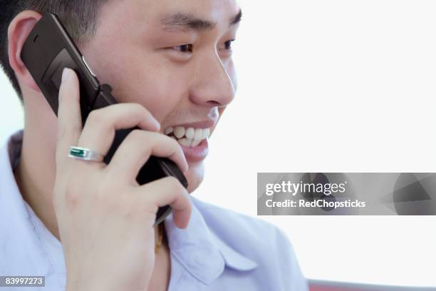 Man Using Red Telephone 213 Red Flip Phone Stock Photos, High-Res Pictures, and Images - Getty ...