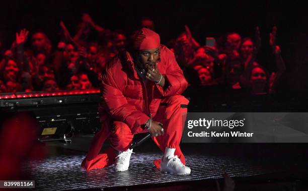 Kendrick Lamar performs onstage during the 2017 MTV Video Music Awards at The Forum on August 27, 2017 in Inglewood, California.