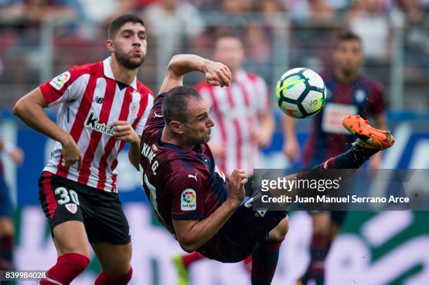 Kike Garcia of SD Eibar duels for the ball with Unai Nunez of Athletic Club during the La Liga match between SD Eibar and Athletic Club Bilbao at...