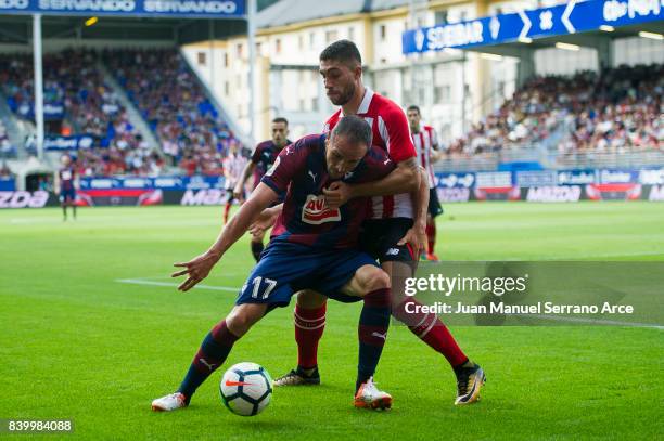 Kike Garcia of SD Eibar duels for the ball with Unai Nunez of Athletic Club during the La Liga match between SD Eibar and Athletic Club Bilbao at...