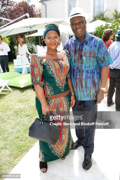 Minister of Culture of 'Cote d'Ivoire', Maurice Kouakou Bandaman and his wife attend the 10th Angouleme French-Speaking Film Festival : Day Six on...