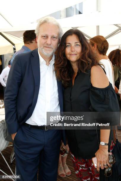 General Director of TV5 Monde, Yves Bigot and actress Cristiana Reali attend the 10th Angouleme French-Speaking Film Festival : Closing Ceremony on...