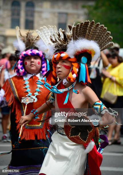 Young Native American members of the Edaakie Junior Dance Group from Zuni Pueblo near Gallup, New Mexico, perform at the Santa Fe Indian Market in...