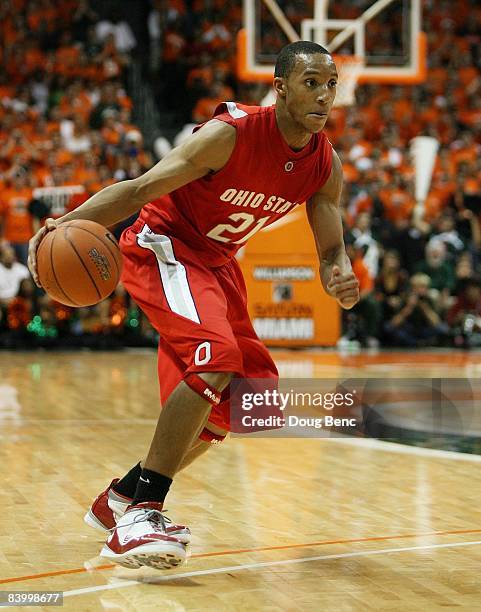 Evan Turner of the Ohio State Buckeyes drives against the Miami Hurricanes at BankUnited Center on December 2, 2008 in Coral Gables, Florida. Ohio...