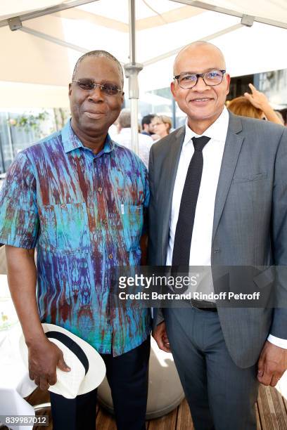 Minister of Culture of 'Cote d'Ivoire', Maurice Kouakou Bandaman and Prefect of Charente Pierre N'Gahane attend the 10th Angouleme French-Speaking...