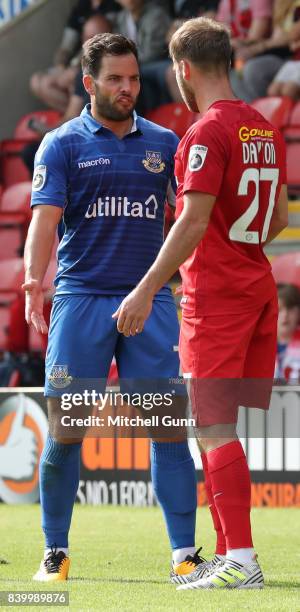 Sam Wood of Eastleigh and James Dayton of Leyton Orient exchange words during the National League match between Leyton Orient and Eastleigh at The...