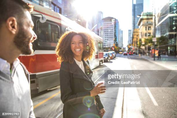 people meetup in downtown going to work in the morning - toronto stock pictures, royalty-free photos & images