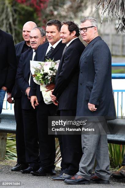 Former All Blacks Sir Michael Jones, Josh Kronfeld and Sir John Kirwan arrive the Funeral Service for Sir Colin Meads on August 28, 2017 in Te Kuiti,...