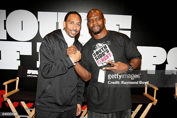 Sports reporter Stephen A. Smith poses for a photo with actor Terry Crews during the grand opening of House of Hoops by foot locker in North...
