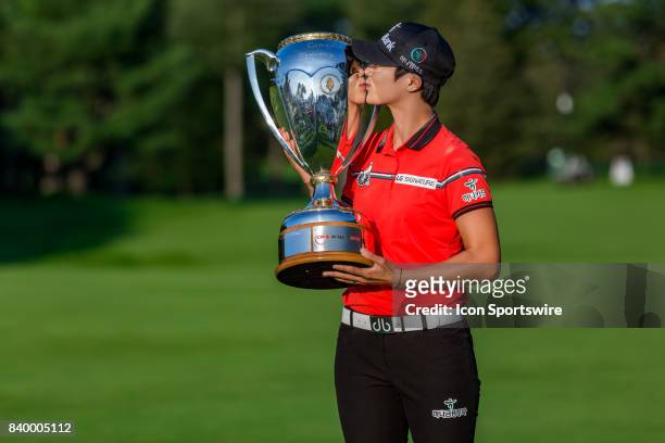 Canadian Pacific Women's Open champion Sung Hyun Park kisses the trophy after the final round of the Canadian Pacific Women's Open on August 27, 2017...