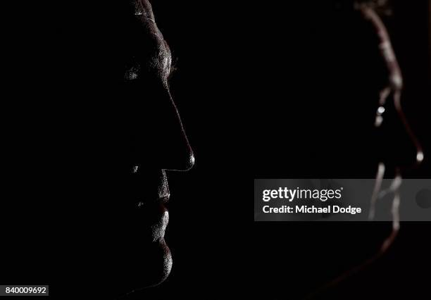 Magpies head coach Nathan Buckley looks on with President Eddie during a Collingwood Magpies AFL press conference at the Holden Centre on August 28,...